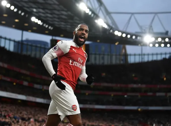 Framed Print : Arsenal's Alexandre Lacazette Goes Head-to-Head with Tottenham in Premier League Showdown