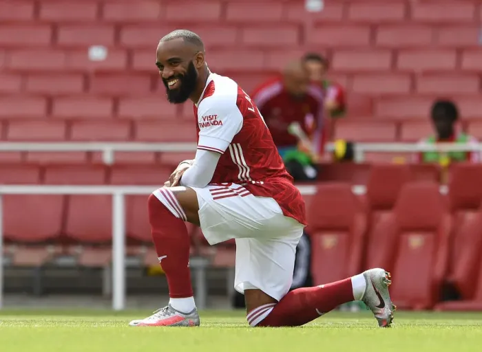 Framed Print : Arsenal's Alexandre Lacazette Takes a Knee During Arsenal v Watford Premier League Match Framed Print : Arsenal's Alexandre Lacazette Takes a Knee During Arsenal v Watford Premier League Match