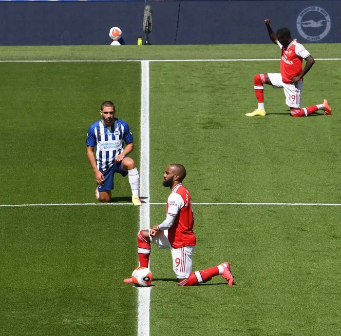 Framed Print : Arsenal's Alexandre Lacazette Takes a Knee During Brighton & Hove Albion Match Framed Print : Arsenal's Alexandre Lacazette Takes a Knee During Brighton & Hove Albion Match