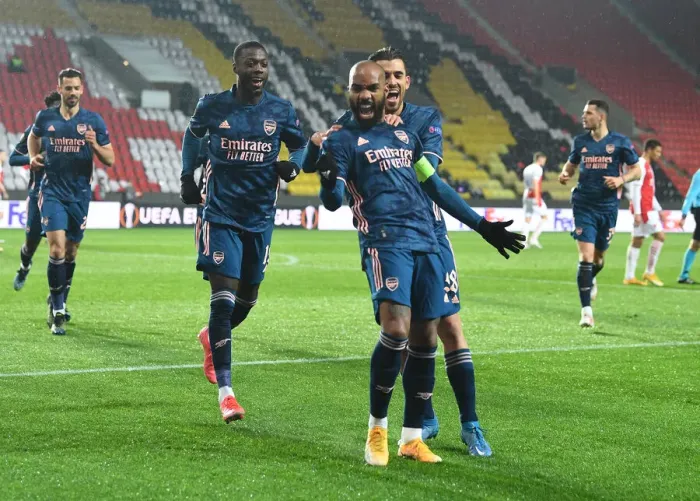 Framed Print : Arsenal's Alexis Lacazette, Dani Ceballos, and Nicolas Pepe Celebrate Goals in Empty Eden Arena during Slavia Prague vs Arsenal UEFA Europa League Quarterfinal