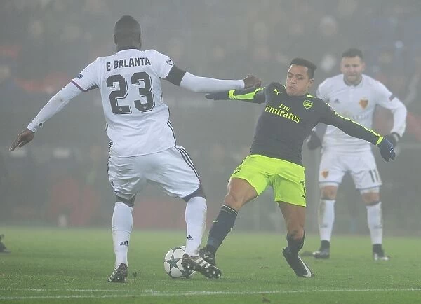 Arsenal's Alexis Sanchez Faces Off Against Basel's Eder Balanta in 2016-17 UEFA Champions League Clash