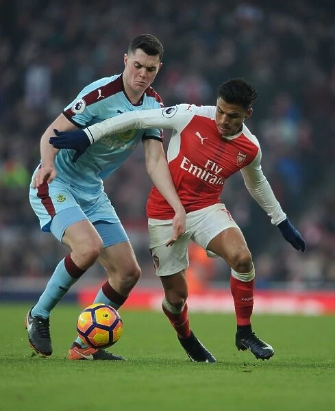 Arsenal's Alexis Sanchez Faces Off Against Burnley's Michael Keane in Premier League Clash