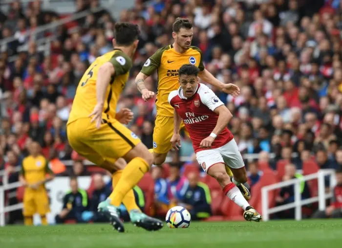 Framed Print : Arsenal's Alexis Sanchez Faces Off Against Christian Gross in Premier League Clash vs Brighton & Hove Albion Framed Print : Arsenal's Alexis Sanchez Faces Off Against Christian Gross in Premier League Clash vs Brighton & Hove Albion