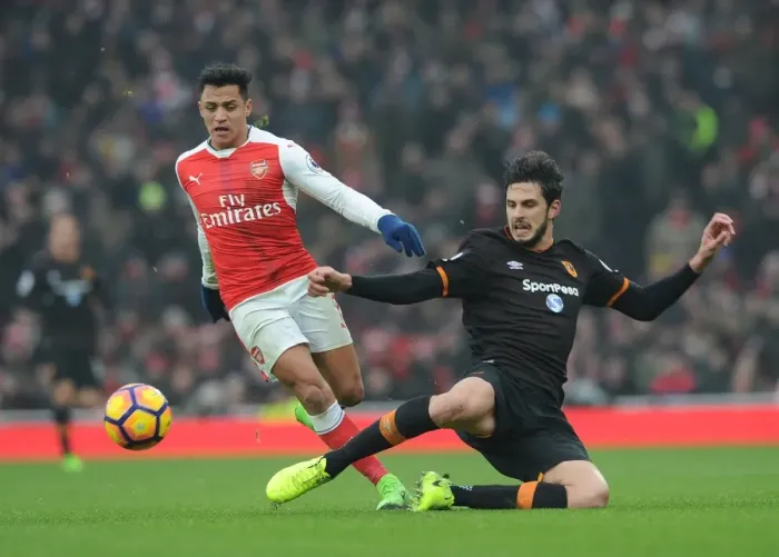 Framed Print : Arsenal's Alexis Sanchez Faces Off Against Hull City's Andrea Ranocchia in Premier League Clash Framed Print : Arsenal's Alexis Sanchez Faces Off Against Hull City's Andrea Ranocchia in Premier League Clash