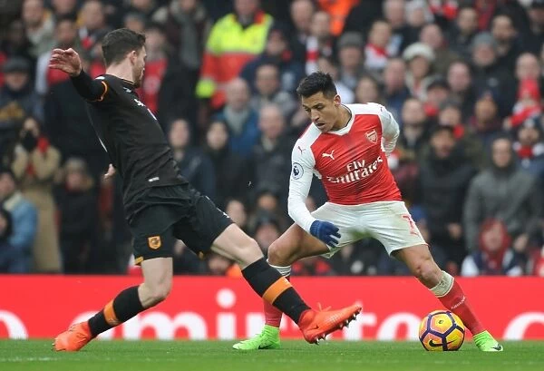 Arsenal's Alexis Sanchez Faces Off Against Hull's Andrew Robertson in Premier League Clash