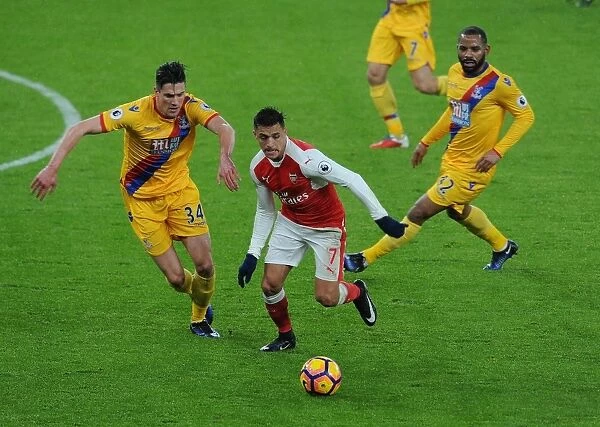 Arsenal's Alexis Sanchez Faces Off Against Martin Kelly and Jason Puncheon of Crystal Palace (2016-17)