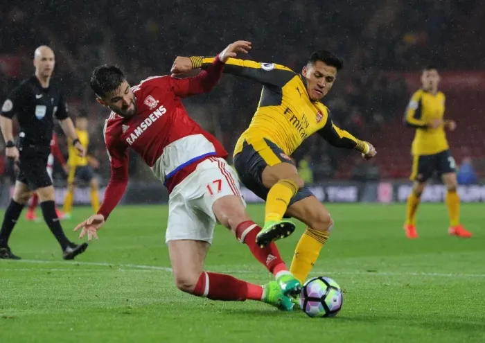 Framed Print : Arsenal's Alexis Sanchez Faces Off Against Middlesbrough's Antonio Barragan