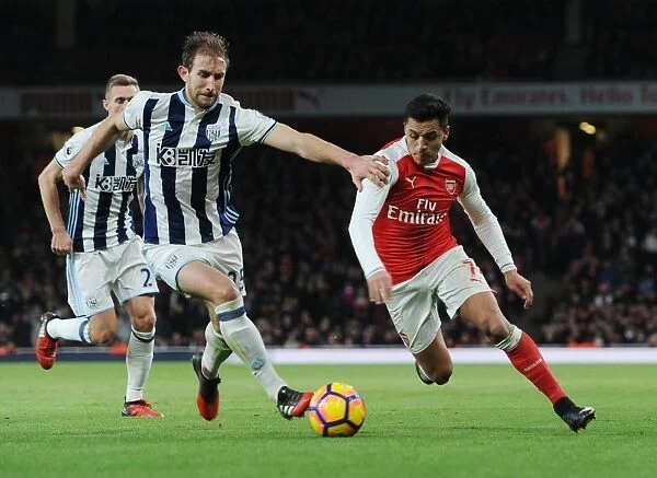 Arsenal's Alexis Sanchez Faces Off Against West Brom's Craig Dawson in Premier League Clash (December 2016)
