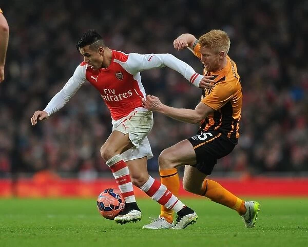 Arsenal's Alexis Sanchez Fends Off Hull City's Paul McShane in FA Cup Clash