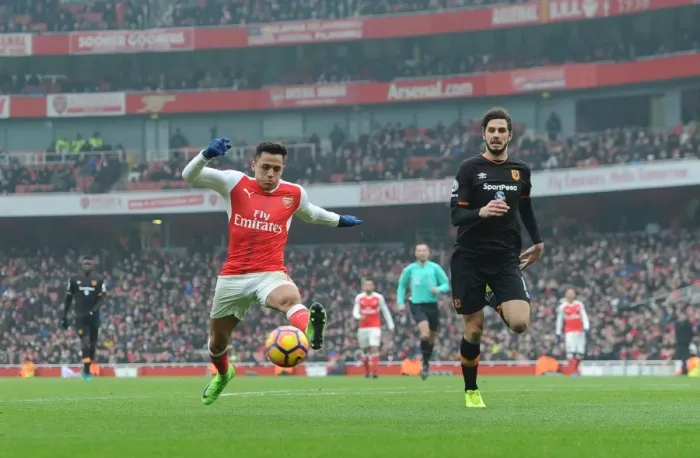 Framed Print : Arsenal's Alexis Sanchez Fends Off Hull's Andrea Ranocchia During Premier League Clash Framed Print : Arsenal's Alexis Sanchez Fends Off Hull's Andrea Ranocchia During Premier League Clash
