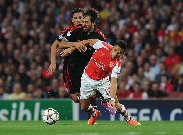 Arsenal's Alexis Sanchez Fouls Olcay Sahan of Besiktas in UEFA Champions League Qualifier
