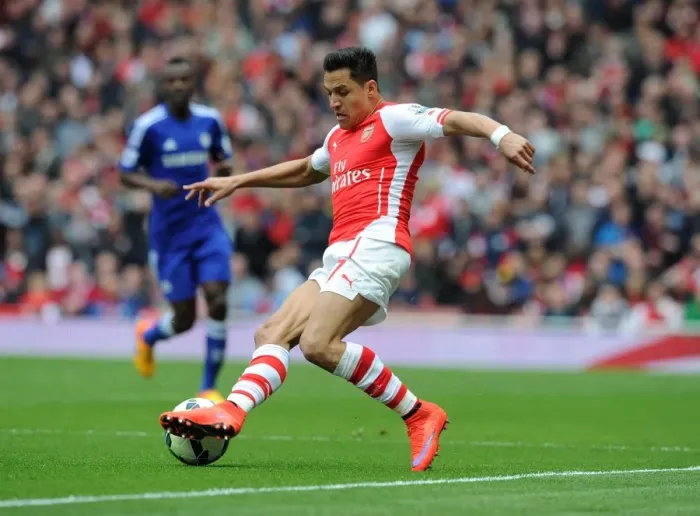 Framed Print : Arsenal's Alexis Sanchez Goes Head-to-Head Against Chelsea in Premier League Clash