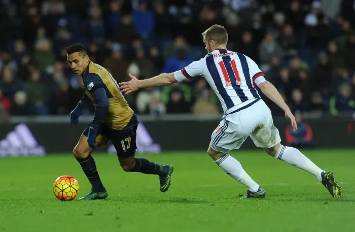 Framed Print : Arsenal's Alexis Sanchez Goes Head-to-Head with Chris Brunt in Premier League Clash: West Bromwich Albion vs. Arsenal (November 2015)