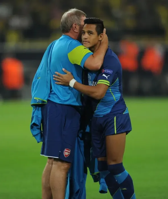 Framed Print : Arsenal's Alexis Sanchez and Kitman Vic Akers Before Borussia Dortmund Clash in Champions League (2014) Framed Print : Arsenal's Alexis Sanchez and Kitman Vic Akers Before Borussia Dortmund Clash in Champions League (2014)