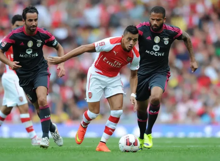 Framed Print : Arsenal's Alexis Sanchez Outmaneuvers Benfica's Ruben Amorim during the Emirates Cup Clash Framed Print : Arsenal's Alexis Sanchez Outmaneuvers Benfica's Ruben Amorim during the Emirates Cup Clash