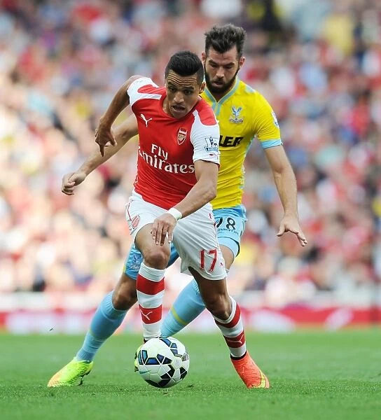 Arsenal's Alexis Sanchez Outmaneuvers Crystal Palace's Joe Ledley