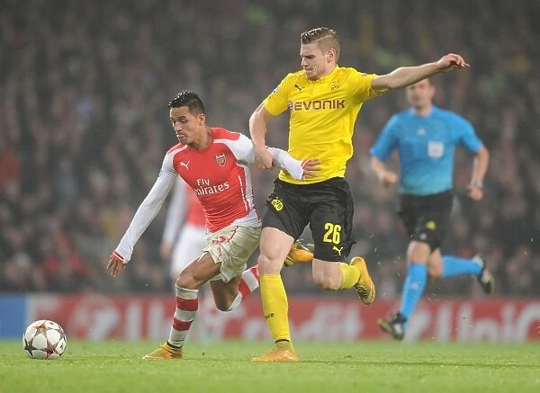 Arsenal's Alexis Sanchez Outmaneuvers Dortmund's Lukas Piszczek in 2014-15 Champions League Clash