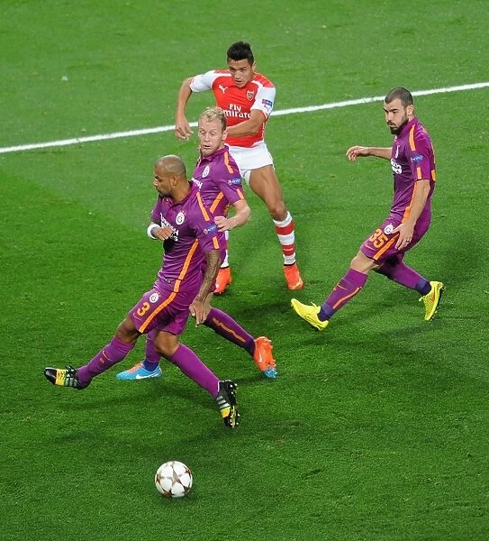 Arsenal's Alexis Sanchez Takes On Galatasaray's Defense in 2014 Champions League Clash