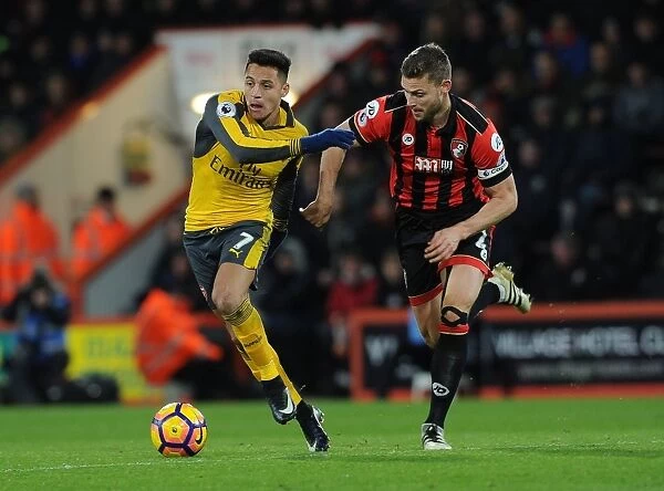 Arsenal's Alexis Sanchez vs. Bournemouth's Simon Francis: A Premier League Battle