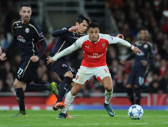 Framed Print : Arsenal's Alexis Sanchez vs. Dinamo Zagreb's Leonardo Sigali: A Battle in the 2015-16 UEFA Champions League Framed Print : Arsenal's Alexis Sanchez vs. Dinamo Zagreb's Leonardo Sigali: A Battle in the 2015-16 UEFA Champions League