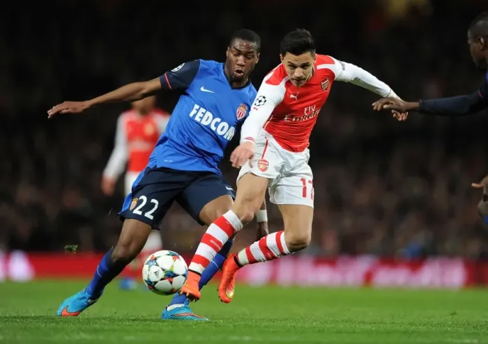 Framed Print : Arsenal's Alexis Sanchez vs Monaco's Geoffrey Kondogbia: A Champions League Battle Framed Print : Arsenal's Alexis Sanchez vs Monaco's Geoffrey Kondogbia: A Champions League Battle