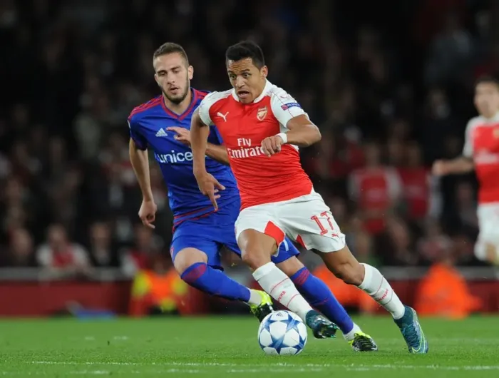 Framed Print : Arsenal's Alexis Sanchez vs. Olympiacos Kostas Fortounis: A 2015 / 16 Champions League Showdown Framed Print : Arsenal's Alexis Sanchez vs. Olympiacos Kostas Fortounis: A 2015 / 16 Champions League Showdown