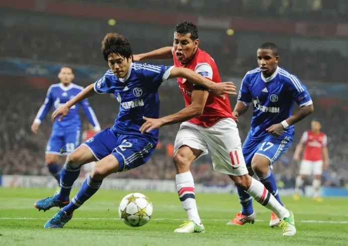 Framed Print : Arsenal's Andre Santos Clashes with Schalke's Atsuto Uchida and Jefferson Farfan Framed Print : Arsenal's Andre Santos Clashes with Schalke's Atsuto Uchida and Jefferson Farfan
