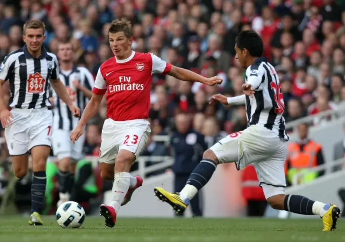 Framed Print : Arsenal's Andrey Arshavin Faces Off Against Gonzalo Jara of West Bromwich Albion in Intense Barclays Premier League Clash Framed Print : Arsenal's Andrey Arshavin Faces Off Against Gonzalo Jara of West Bromwich Albion in Intense Barclays Premier League Clash