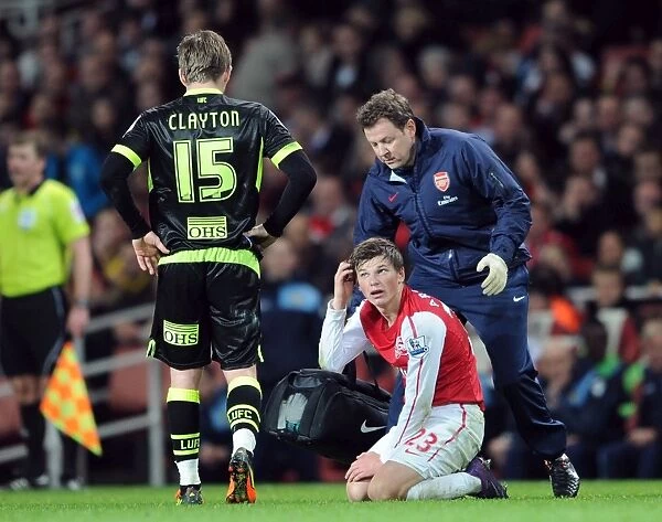 Arsenal's Andrey Arshavin Receives Treatment from Physio during Arsenal v Leeds United FA Cup Match