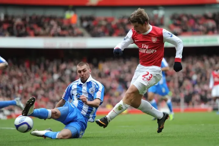 Framed Print : Arsenal's Andrey Arshavin Scores the Winner Against Huddersfield's Jack Hunt in FA Cup Fourth Round
