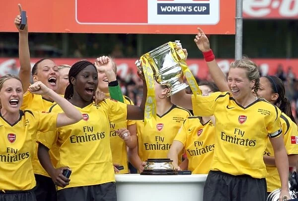 Arsenal's Anita Asante and Jayne Ludlow Triumphantly Lift the FA Cup