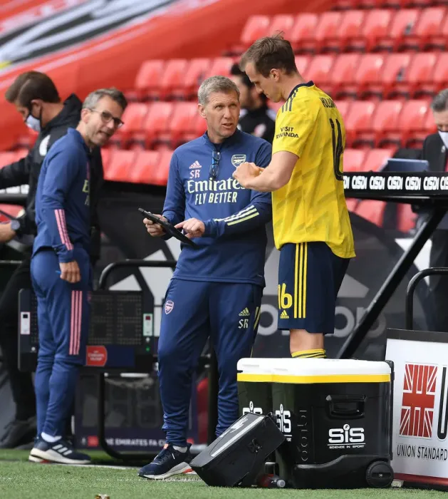 Framed Print : Arsenal's Assistant Coach Steve Round Speaks to Rob Holding during FA Cup Quarterfinal vs Sheffield United Framed Print : Arsenal's Assistant Coach Steve Round Speaks to Rob Holding during FA Cup Quarterfinal vs Sheffield United