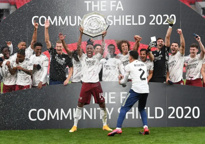 Framed Print : Arsenal's Aubameyang Celebrates FA Community Shield Victory with Champagne Spray