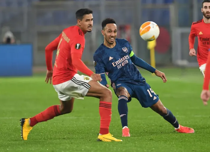 Framed Print : Arsenal's Aubameyang Clashes with Benfica's Verissimo in Europa League Showdown Framed Print : Arsenal's Aubameyang Clashes with Benfica's Verissimo in Europa League Showdown