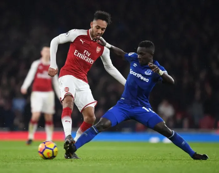 Framed Print : Arsenal's Aubameyang Clashes with Everton's Gueye in Premier League Showdown Framed Print : Arsenal's Aubameyang Clashes with Everton's Gueye in Premier League Showdown