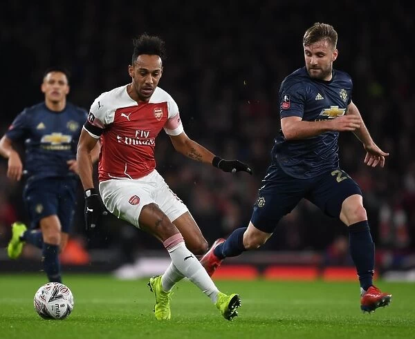 Arsenal's Aubameyang Clashes with Shaw in FA Cup Battle at Emirates Stadium: Arsenal vs Manchester United