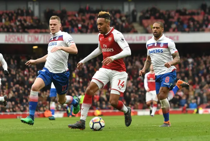 Framed Print : Arsenal's Aubameyang Clashes with Stoke's Shawcross and Johnson