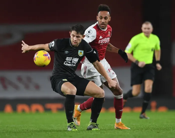 Framed Print : Arsenal's Aubameyang Closes In on Burnley's Tarkowski in Premier League Clash