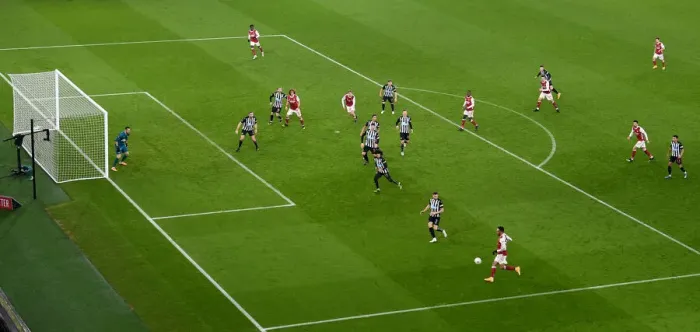 Framed Print : Arsenal's Aubameyang Crosses for FA Cup Win against Newcastle