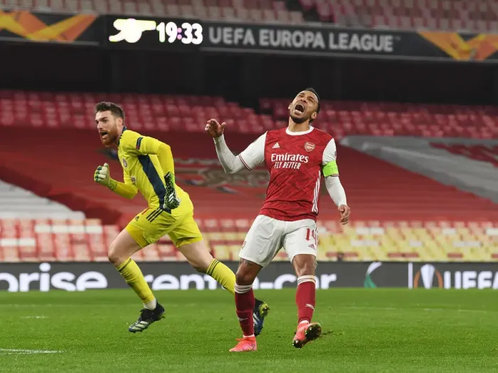 Framed Print : Arsenal's Aubameyang Displays Frustration in Empty Emirates During Europa League Match vs. Olympiacos Framed Print : Arsenal's Aubameyang Displays Frustration in Empty Emirates During Europa League Match vs. Olympiacos