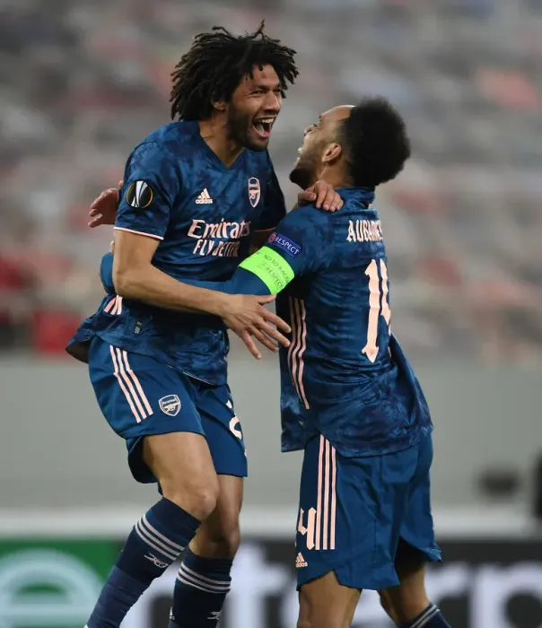 Framed Print : Arsenal's Aubameyang and Elneny Celebrate Goals in Empty Olympiacos Stadium during Europa League Match