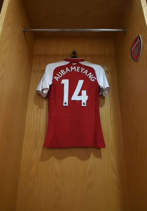 Framed Print : Arsenal's Aubameyang-Emblazoned Jersey in the Emirates Changing Room (Arsenal v Southampton, 2017-18)