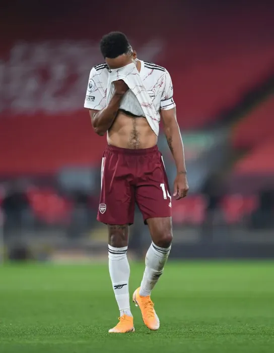 Framed Print : Arsenal's Aubameyang Faces Empty Anfield in 2020-21 Premier League Showdown Against Liverpool: A Silent Battle at Anfield Framed Print : Arsenal's Aubameyang Faces Empty Anfield in 2020-21 Premier League Showdown Against Liverpool: A Silent Battle at Anfield