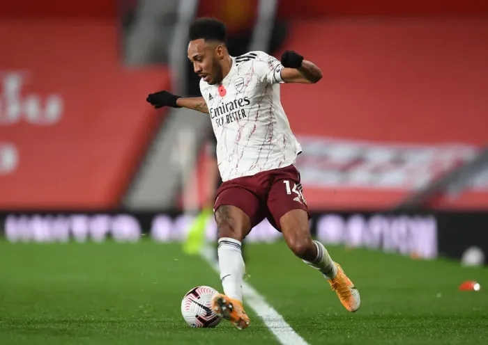 Framed Print : Arsenal's Aubameyang Faces Manchester United in Empty Old Trafford (2020-21 Premier League) Framed Print : Arsenal's Aubameyang Faces Manchester United in Empty Old Trafford (2020-21 Premier League)
