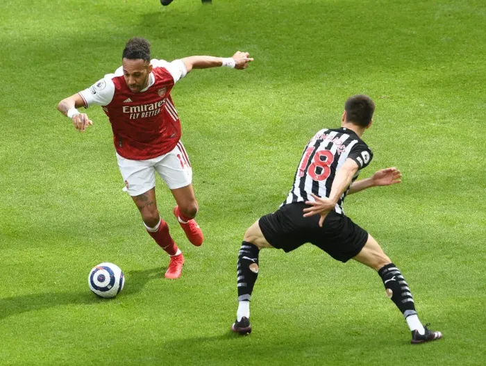 Framed Print : Arsenal's Aubameyang Faces Newcastle's Fernandez in Empty St. James Park (Newcastle United vs Arsenal, 2021-22 Premier League) Framed Print : Arsenal's Aubameyang Faces Newcastle's Fernandez in Empty St. James Park (Newcastle United vs Arsenal, 2021-22 Premier League)