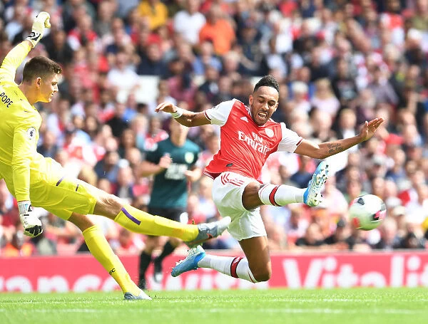 Arsenal's Aubameyang Faces Off Against Burnley's Pope in Premier League Clash