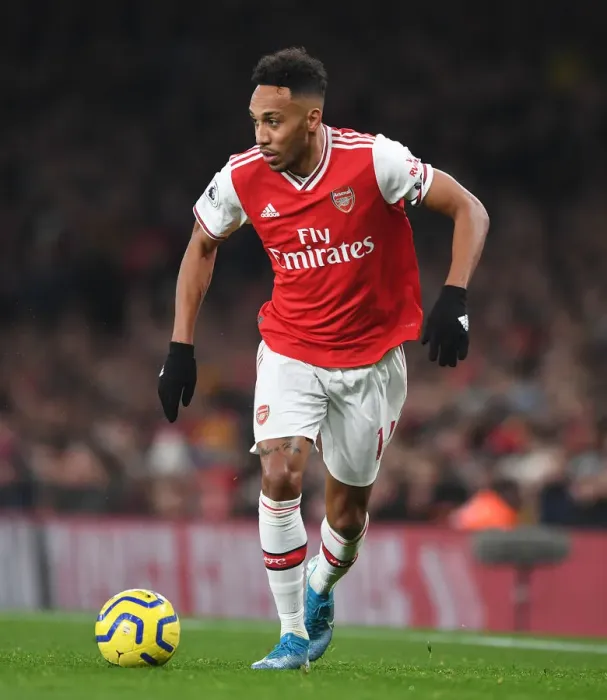 Framed Print : Arsenal's Aubameyang Faces Off Against Manchester United in Premier League Clash (2019-20) Framed Print : Arsenal's Aubameyang Faces Off Against Manchester United in Premier League Clash (2019-20)