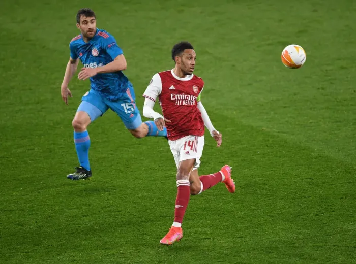 Framed Print : Arsenal's Aubameyang Faces Off Against Olympiacos in Empty Emirates: Europa League Clash Amidst Pandemic Framed Print : Arsenal's Aubameyang Faces Off Against Olympiacos in Empty Emirates: Europa League Clash Amidst Pandemic