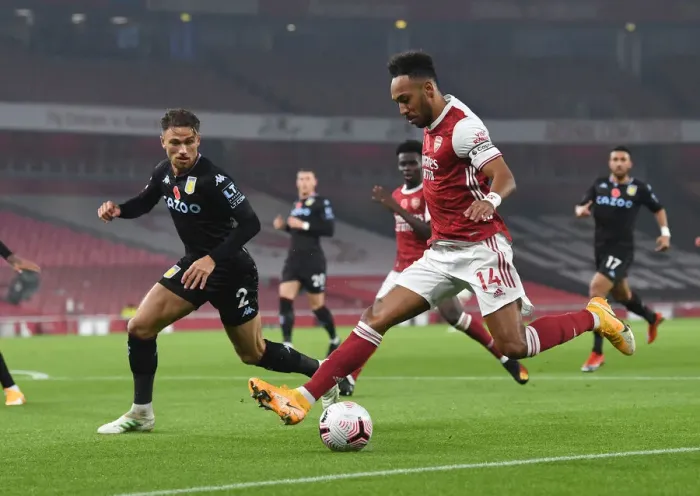 Framed Print : Arsenal's Aubameyang Faces Off Against Villa's Cash in Premier League Clash Framed Print : Arsenal's Aubameyang Faces Off Against Villa's Cash in Premier League Clash