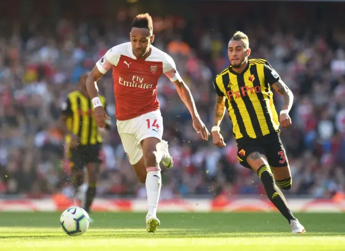 Framed Print : Arsenal's Aubameyang Faces Off Against Watford's Pereyra in Premier League Clash Framed Print : Arsenal's Aubameyang Faces Off Against Watford's Pereyra in Premier League Clash